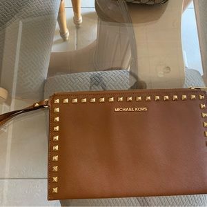 Michael Kors clutch and wristlet purse. Never used!!!